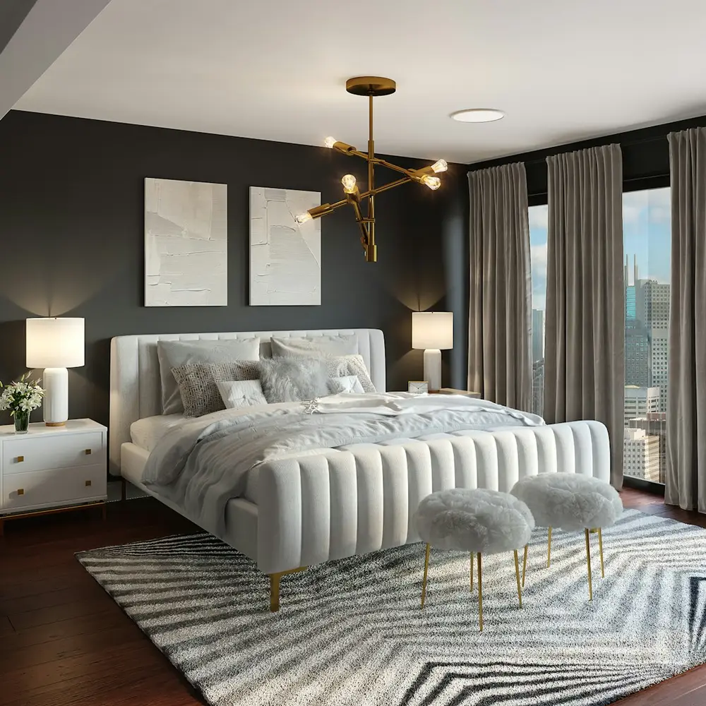 Chambre principale aux teintes profondes, tête de lit tapissée et bois sombre